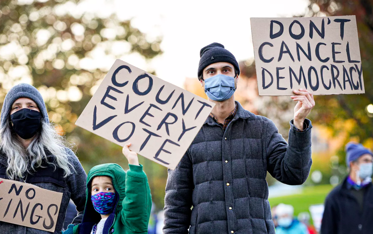 protesters with Count Every Vote sign